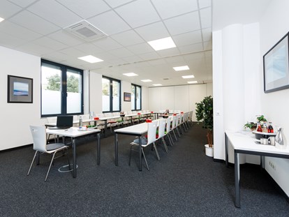Eventlocation - Art der Location: Veranstaltungsraum - Aschheim - In den ecos work spaces kann man die Räume flexibel erweitern oder verkleiner - ecos work spaces München