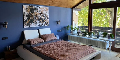 Eventlocation - Art der Location: Haus - Planegg - Schlafzimmer - Einfamilienhaus mit Garten in Milbertshofen