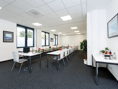 Eventlocation - Art der Location: Seminarraum - Straßlach-Dingharting - In den ecos work spaces kann man die Räume flexibel erweitern oder verkleiner - ecos work spaces München