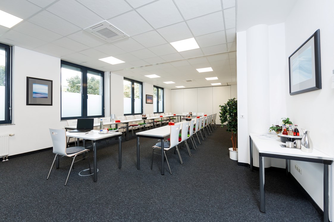 Location: In den ecos work spaces kann man die Räume flexibel erweitern oder verkleiner - ecos work spaces München